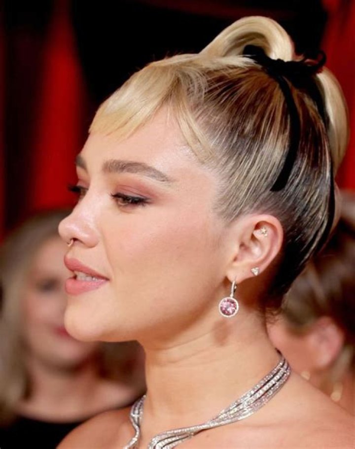 All About Florence Pugh’s Piercings And Tattoos