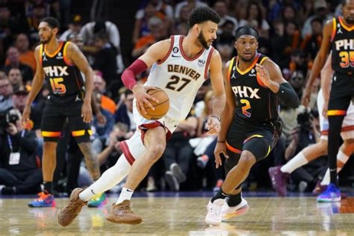 Booker scores 47, Durant adds 39, Suns beat Nuggets 121-114