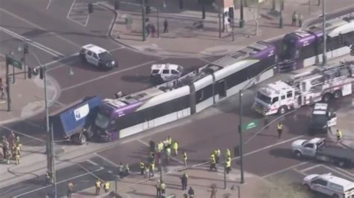 Garbage truck, light rail crash in Mesa