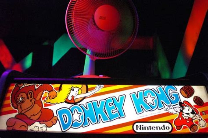 I must play the 20-foot-tall Donkey Kong arcade game
