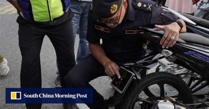 Malaysian biker caught with ‘world’s smallest number plate’– tiny as a fingernail