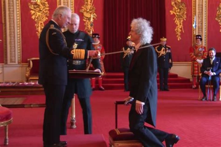Queen musician Brian May formally knighted by King Charles