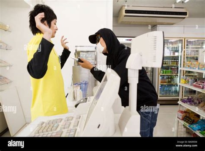 	ROBBER THREATENS CONVENIENCE-STORE CLERK WITH KNIFE	