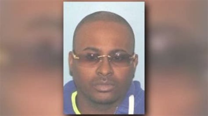 	SHOOTINGS SUSPECT WANTED IN MURDER	
