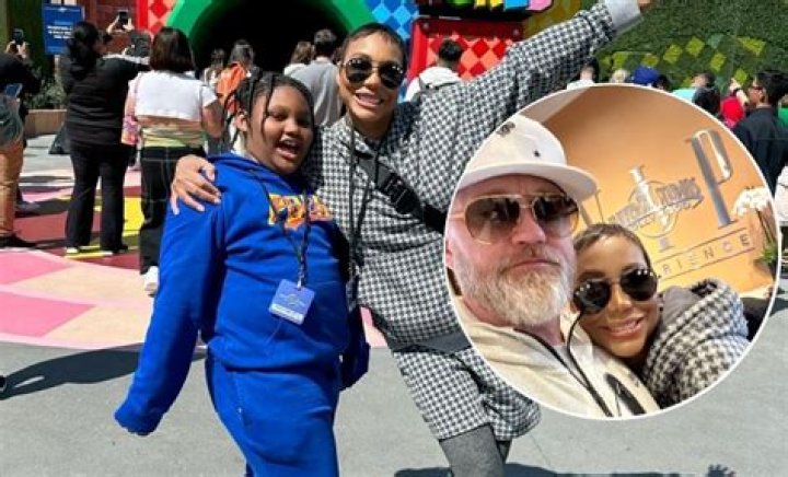 TAMAR BRAXTON, SON AND FIANCE HAD A FUN DAY AT UNIVERSAL STUDIOS