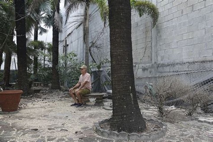 	The old man and the high-rise: His tiny home surrounded, he battles developer over dying garden	