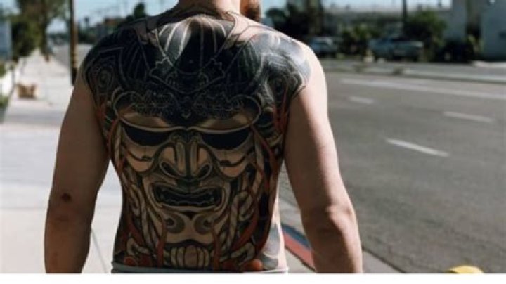What is the meaning behind Alexander Volkov's back tattoo?