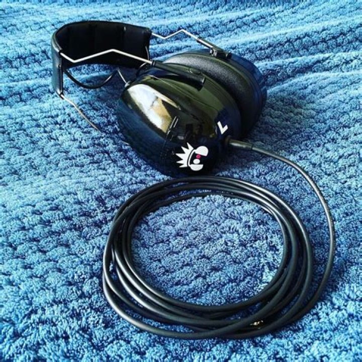 Why Do Drummers Wear Headphones & What Do They Listen?